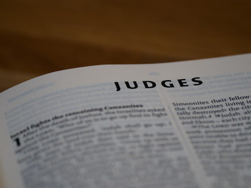 An open bible on the chapter of Judges