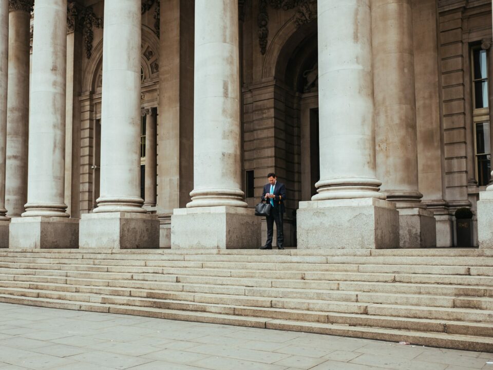 Man waiting in front a court