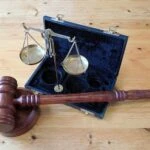 The judge's gavel and a scale of justice